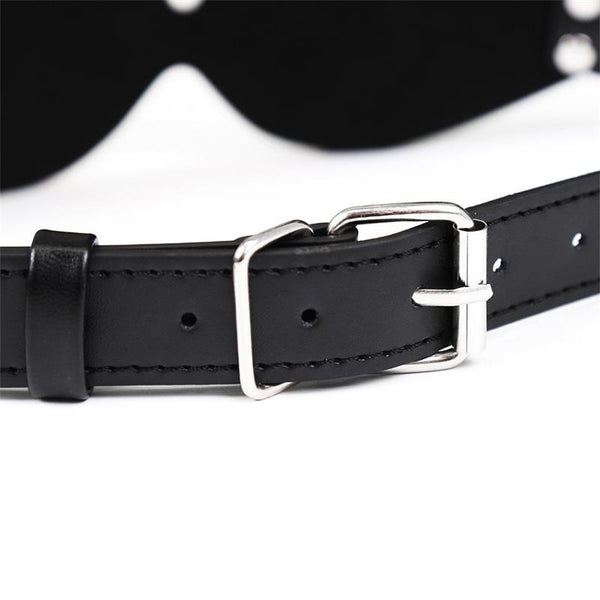 Comfortable faux leather sleep mask with adjustable straps